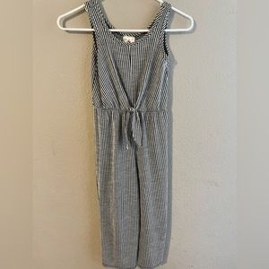 Girls size 8, black and white striped jumpsuit